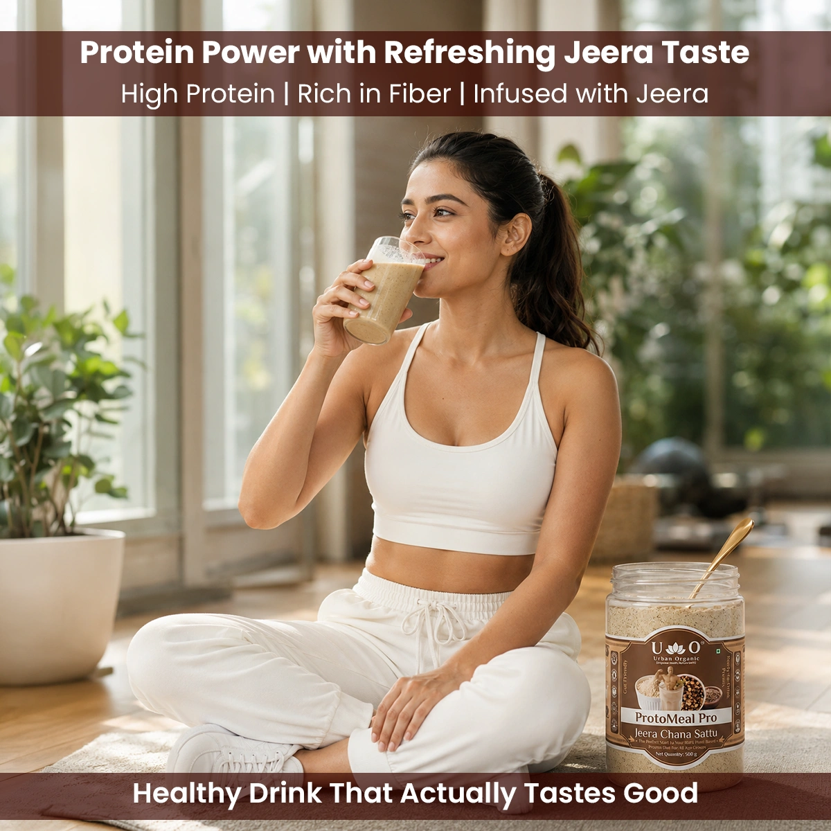 Woman drinking Urban Organic Jeera Chana Sattu indoors for high plant-based protein and fiber